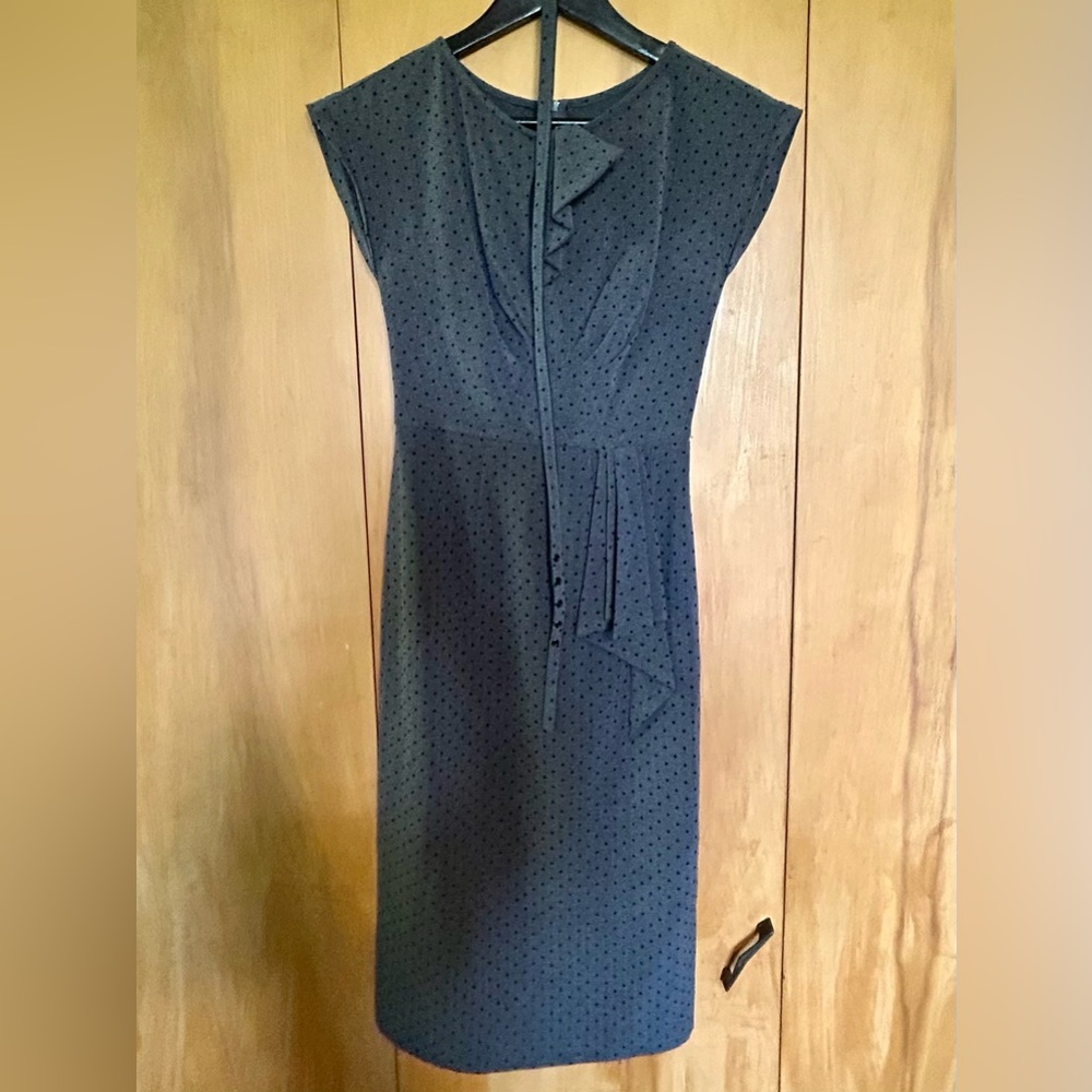 Gorgeous form fitting with perfectly placed ruffles.